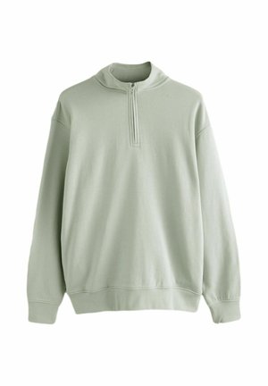Light green long-sleeve pullover with quarter-zip collar and ribbed cuffs and hem, displayed on a white background.