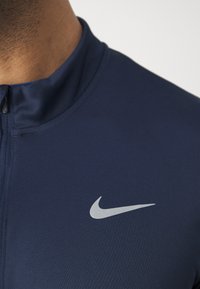 Nike Performance PACER granatowy