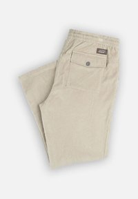 Pantalon en velours côtelé beige avec un motif à rayures verticales. Il possède une taille élastique et une poche arrière avec fermeture par bouton.