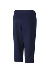 Marinefarbene sportliche Capri-Hosen aus glattem Material, mit einem elastischen Bund und seitlichen Taschen mit weißen Akzenten.