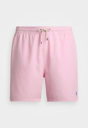 Ljust rosa badshorts i en mjuk tygkvalitet med resårmidja, snörning och en liten blå logotyp på nedre vänstra sidan.