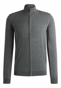 Šedý svetr na zip s vysokým límcem. Pletená textura a dlouhé rukávy. Hladké manžety a lem. Přední centrální zapínání na zip.