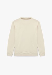 Kremowy sweter z kołnierzykiem polo, długimi rękawami, ściągaczami przy mankietach oraz ściągaczem u dołu. Gładka faktura, minimalistyczny design, jednolity kolor.
