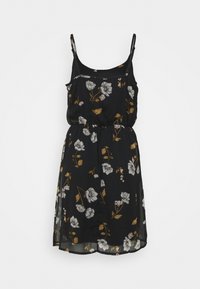 Czarna sukienka w kwiaty z regulowanymi ramiączkami spaghetti, elastyczną talią i lekkim, przezroczystym materiałem z białymi i żółtymi wzorami kwiatowymi.