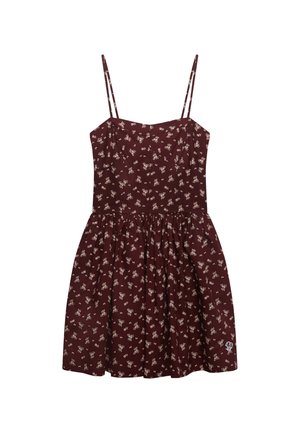 Robe fleurie bordeaux avec fines bretelles, corsage ajusté et jupe évasée. Présente un petit motif de fleurs blanches et un logo décoratif sur l'ourlet.