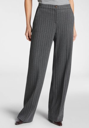 - Spodnie materiałowe