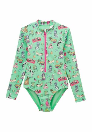 Mintgroene badpak met lange mouwen en roze rits, met kleurrijke cartoonhonden en strandthema-iconen zoals stoelen, ballen en drijvers.