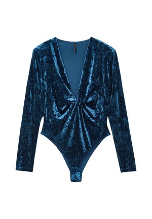 Body in velluto blu profondo, con maniche lunghe, scollatura a V e un design frontale attorcigliato che si trasforma in un fondo a perizoma.