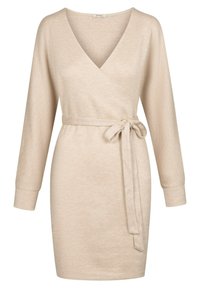 Beige omslagsklänning med långa ärmar och bälte i midjan. Mjuktyg med en slät textur och djup V-ringning.