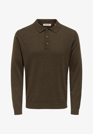 Długa koszulka polo w ciemnym oliwkowym zielonym kolorze, wykonana z miękkiej dzianiny. Posiada klasyczny kołnierzyk, listwę z trzema guzikami oraz ściągacze na mankietach.