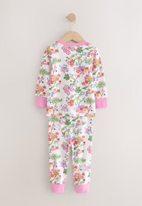 Ensemble de pyjama pour enfants avec manches longues et pantalon. Présente un motif floral aux couleurs variées, des poignets roses et un fond clair.