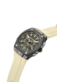 Reloj cronógrafo de cuarzo con un dial verde con patrón, caja de acero inoxidable negro y correa de goma amarilla claro. Incluye acentos plateados.