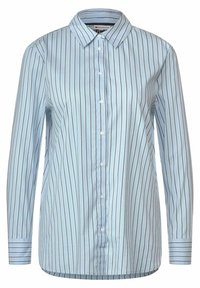 Ljusblå skjorta med knappar, vågräta ränder, långa ärmar, en spetsig krage och en rundad hemsöm. Tillverkad av ett mjukt tyg med knappdetaljer.