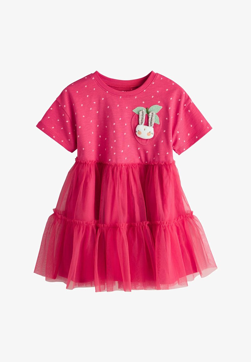 Felroze peuterjurk met korte mouwen, witte stippen, gelaagde tule rok en een konijnenapplicatie met groene bladeren op de borst.