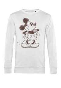 Felpa bianca a maniche lunghe con un disegno marrone di un topo dei cartoni animati con grandi orecchie, mani sui fianchi e scarpe nere.