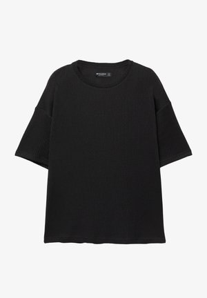 Zwarte oversized T-shirt gemaakt van ribbelstof, met een ronde halslijn en korte, wijde mouwen met een rechte zoom.
