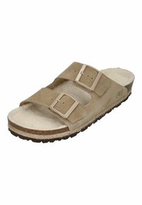 Beige suede slide sandal with two adjustable straps, soft inner lining, and textured rubber sole for grip. Features buckles and cushioning.