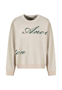 Beige gebreide trui met groene cursieve tekst. Geribbelde halslijn en mouwen, relaxte pasvorm met een zachte textuur.