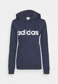 Mörkblå hoodie i bomullsmix, med en känguruficka och vit "adidas"-logotyp över bröstet. Inkluderar justerbar huva.