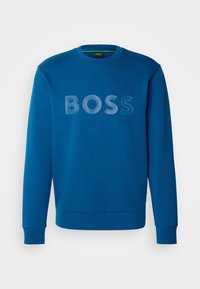 Sweat-shirt bleu à manches longues avec col rond et logo "BOSS" embossé sur la poitrine, poignets et ourlet côtelés.