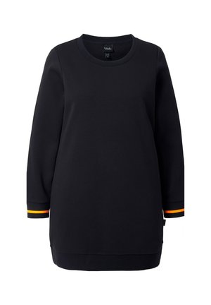 Tunique noire à manches longues en tissu doux. Présente des accents rayés en orange et jaune sur les poignets et un col arrondi.