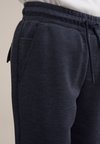Pantaloni cargo - blau