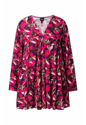 Floral-Tunika mit langen Ärmeln und V-Ausschnitt. Hergestellt aus leichtem Stoff in lebhaftem Pink, Schwarz und Weiß.