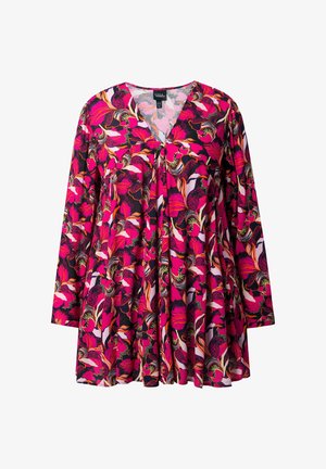 Bloemen tuniek top met lange mouwen, voorzien van een V-hals. Gemaakt van lichtgewicht stof in een levendig kleurenpalet van roze, zwart en wit.