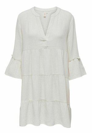 White, textured tunic with a V-neck, three-quarter bell sleeves, and a tiered design. Features a button closure and subtle stitching accents.