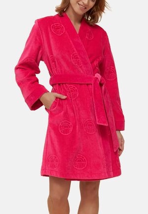 Pink plush bathrobe with a textured pattern, wrap design, long sleeves, belt at the waist, and two front pockets.