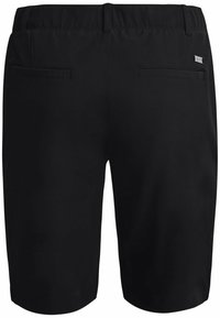 Svarta shorts i ett mjukt, lätt material. Har två bakfickor och en liten metall-logotyp accentuerad på midjebandet.