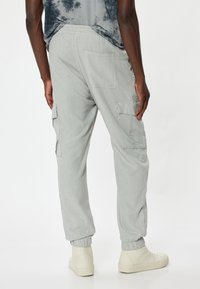 Koton JOGGER  - Reisitaskuhousut - grey