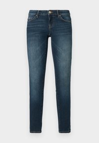 Jeans skinny azul oscuro con ligero desgaste, cierre frontal con botón y diseño de cinco bolsillos sobre un fondo blanco.