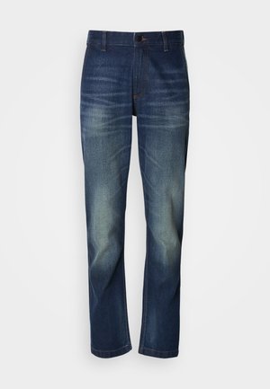 Mørkeblå denimjeans med lige ben, der har falming foran, en knapgylp og standard fem-lomme design.