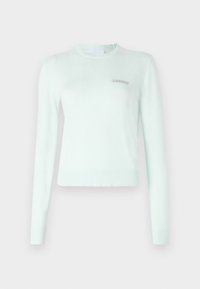 Mintgrønn genser laget av myk stoff, med lange ermene, ribbestrikket halslinning og mansjetter, og et lite brodert logo på brystet.