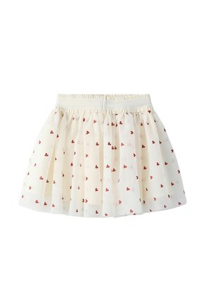 Jupe plissée blanche avec une taille élastique, décorée de petits motifs de cœurs rouges répartis uniformément sur le tissu.