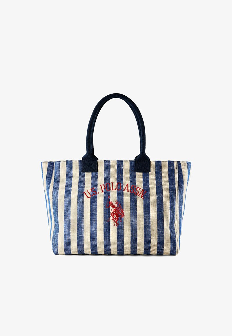 Sac fourre-tout rayé bleu et blanc avec poignées bleu marine, présentant un logo rouge de U.S. Polo Assn. et un emblème brodé de joueur de polo sur le devant.