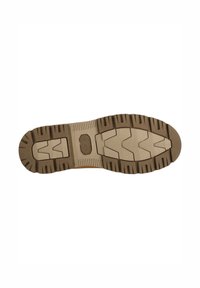Sko yttersula i tan gummi med djupa däckmönster, inklusive zigzag-mönster, ett solitt oval område och texturerade sektioner för grepp och stabilitet.