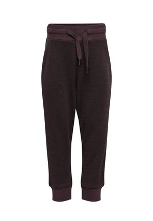 Mörkbruna sweatpants med en strukturerad yta, elastisk midja med snörning och ribbade muddar vid anklarna.