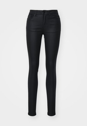 Svart skinny jeans laget av glatt, stretchy denim. Har middels høyde på livet, fem lommer og beltehemper. Klassisk fem-lommers design.