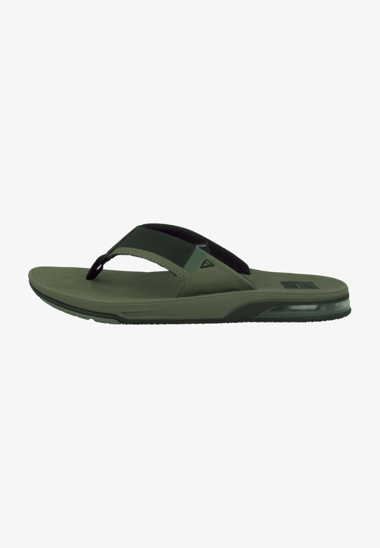 Groene flip-flops met een textuur in de voetbed, synthetische banden en een transparante zool. Heeft een lichte hak en minimale branding.
