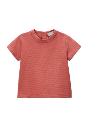 T-shirt pour tout-petit à manches courtes, texturé, de couleur rose, avec un col rond et une fermeture à boutons-pression à l'arrière du col.