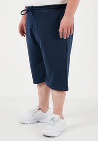 Buratti PLUS SIZE - Verryttelyhousut - indigo