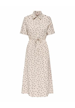 Beige midi-jurk met zwarte polka dots, korte mouwen, knoopsluiting aan de voorkant, puntige kraag en verstelbare tailleband.