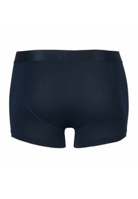 Boxer in cotone blu navy con elastico liscio in vita, gambe corte e dettagli di cuciture minime sul retro.