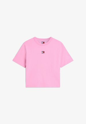 Pinkes kurzärmeliges, bauchfreies T-Shirt mit Rundhalsausschnitt und kleinem Tommy Jeans-Logo in der Mitte der Brust.