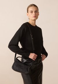 UNISEX - Kézitáska - black