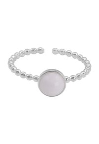 Anello regolabile in argento con banda di perline e incastonatura per una pietra rotonda di colore rosa chiaro. Texture liscia con accenti metallici lucidi.