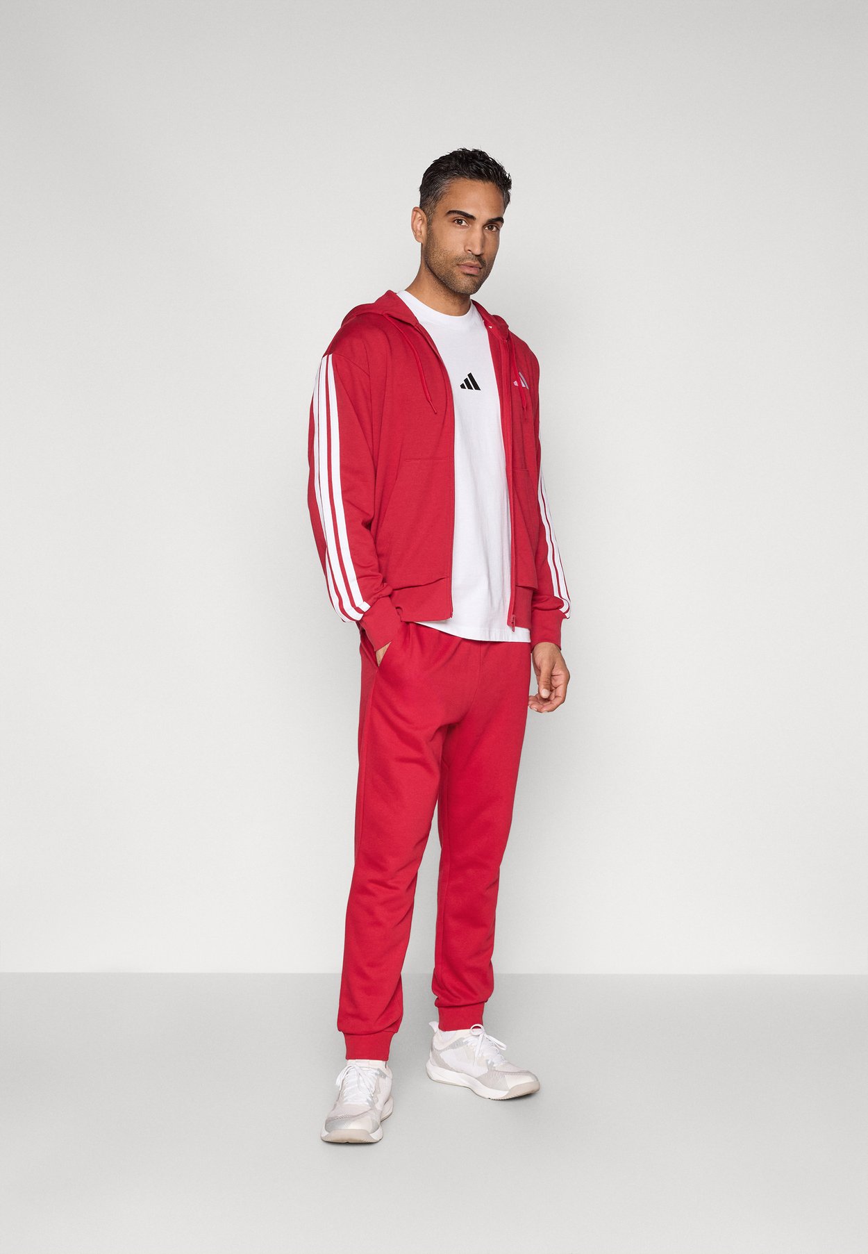 ESSENTIALS THREE STRIPES FRENCH TERRY FULLZIP