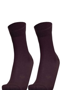 Dunkelviolette Baumwollsocken mit geripptem Muster, in mittlerer Wadenlänge und nahtlosem Zehenbereich. Schlichtes Design ohne sichtbare Muster oder Akzente.